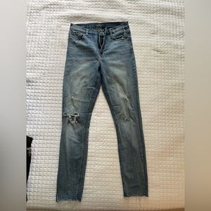 Lucky brand distressed jeans. High wasted. Size 4/27